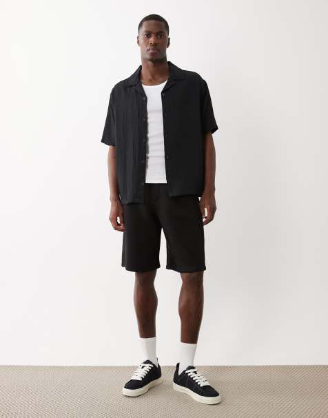 Bershka - Sort T-shirt med korte ærmer i rustik stil - view 1
