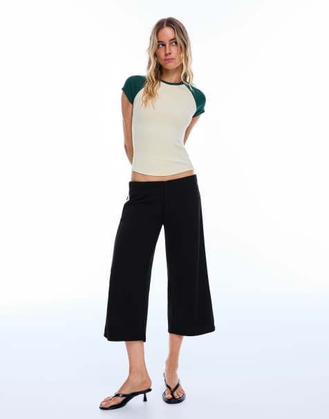 Bershka - Sorte capri-bukser med kontrastfarvede sidestriber - view 1