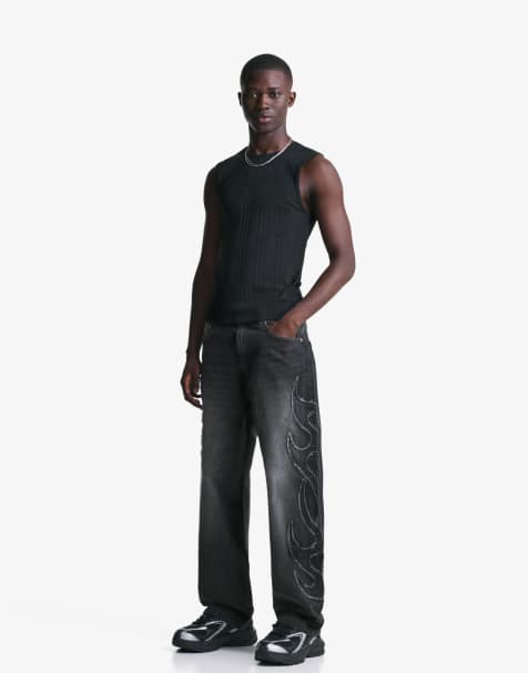 Bershka - Sorte og posede jeans med mærker - view 1