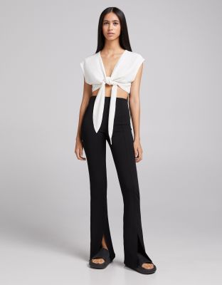 Bershka split hem flare in black - ASOS Price Checker