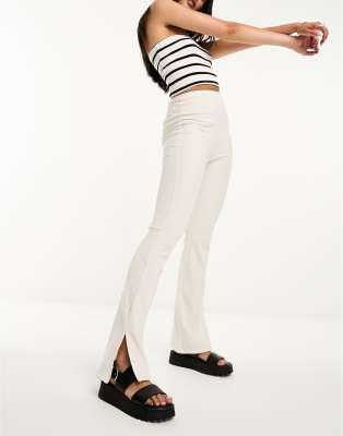 Bershka split hem flared pants in ecru-White