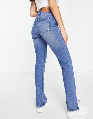 Bershka split hem straight jean in medium blue | ASOS