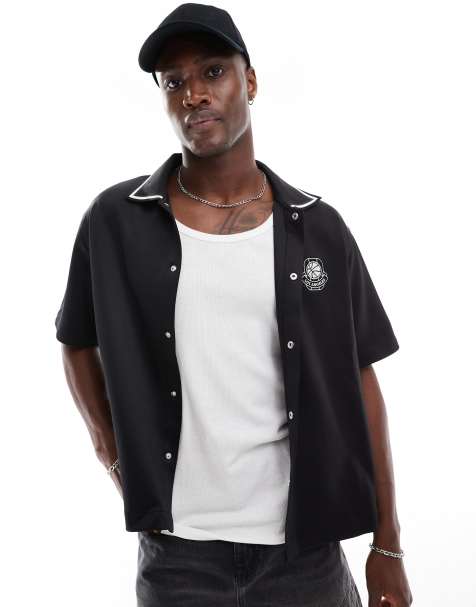 Bershka sports tipped collar shirt in black - view 1