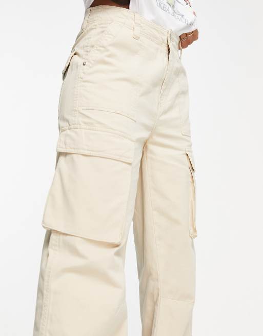 Bershka straight leg cargo pants in beige | ASOS