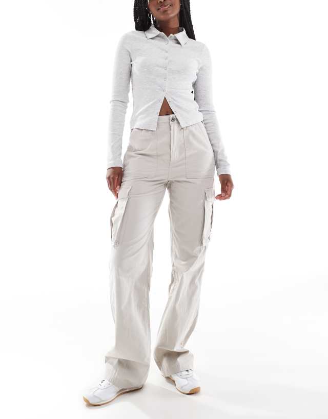 Bershka straight leg cargo pants in stone