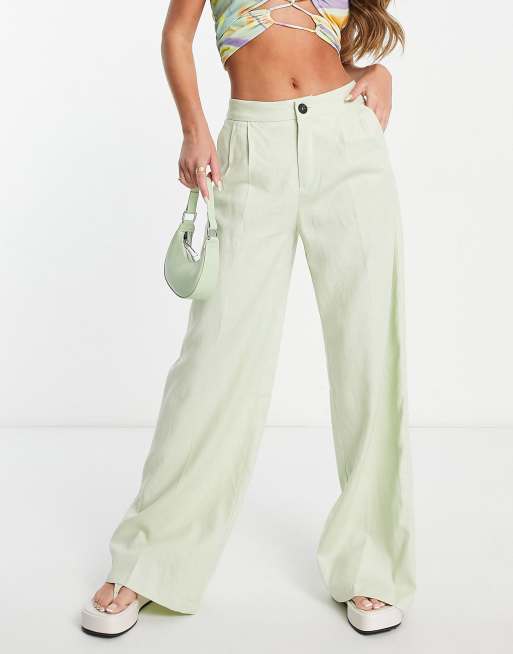 Only high waisted wide leg pants in bright green (part of a set)