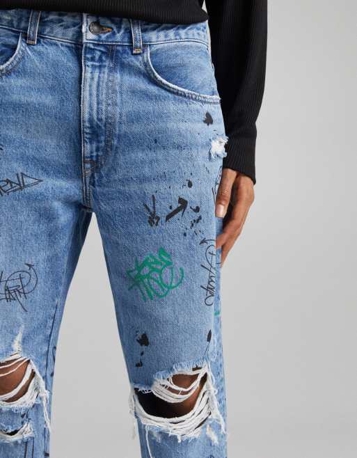 Ripped cuffed offset printing hot sale jeans