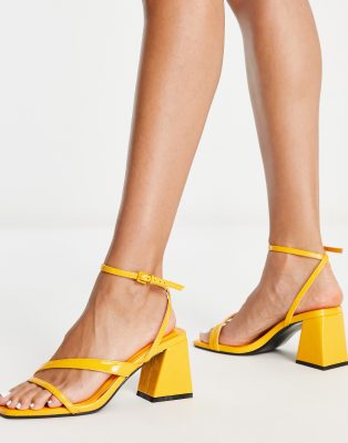 yellow low block heels