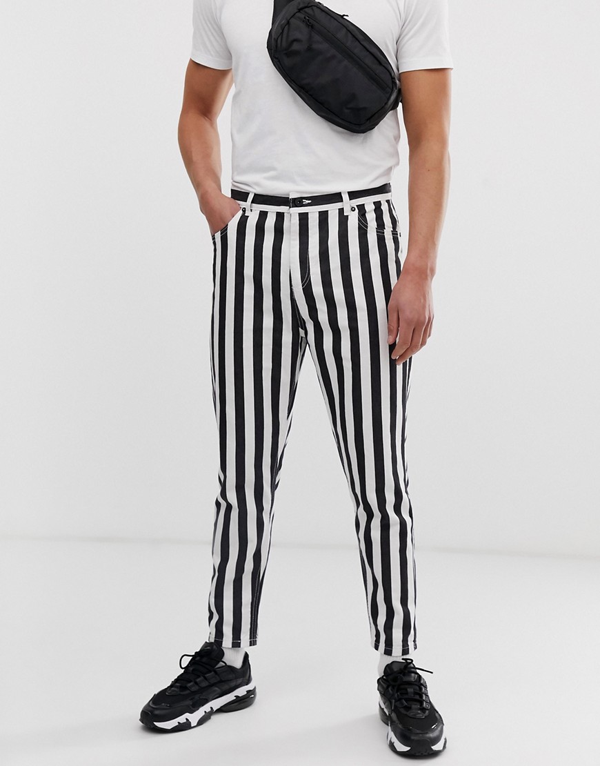 Bershka striped carrot fit jeans in black and white