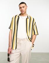 Carhartt WIP bayley polo in yellow | ASOS