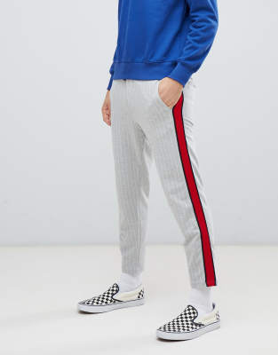 blue sweatpants with red stripe