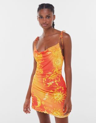 Bershka sun print mesh tie strap mini dress with lettuce hem in orange