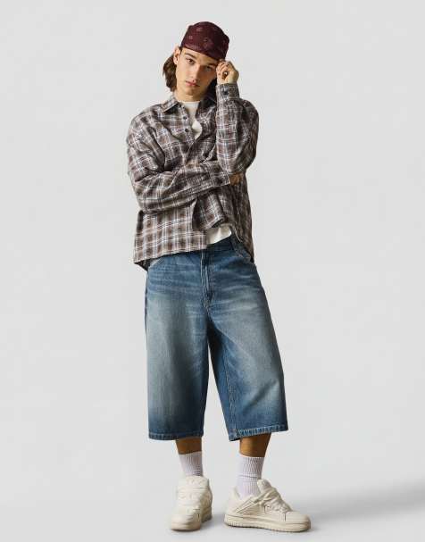 Bershka Super baggy denim bermuda shorts in mid blue - view 1