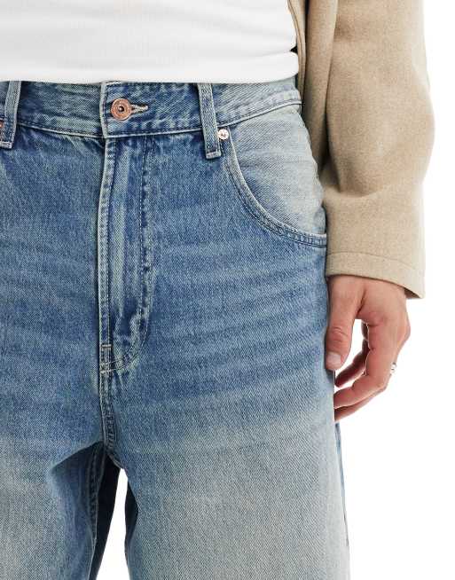 Bershka super baggy fit jeans in washed blue | ASOS
