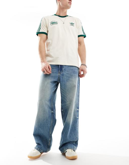 Bershka super baggy jeans in washed mid blue | ASOS