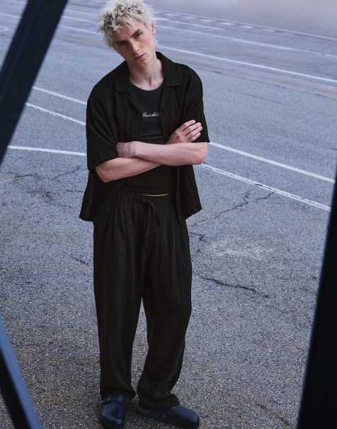 Bershka Super baggy rustic trousers in black - view 1