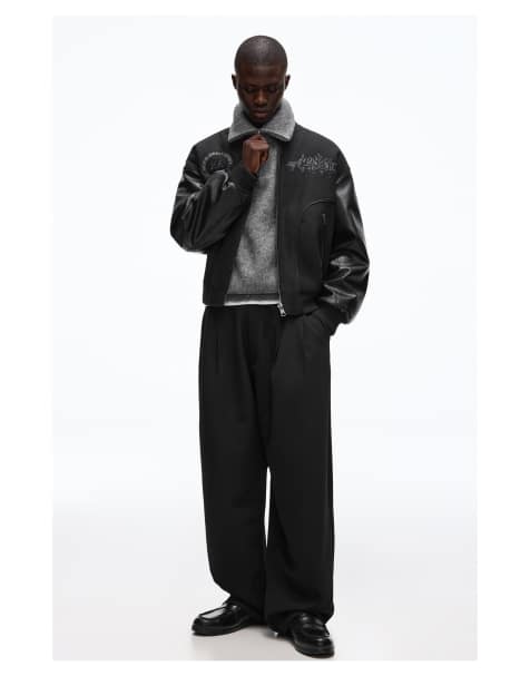 Bershka Super baggy tailored fit trousers in black