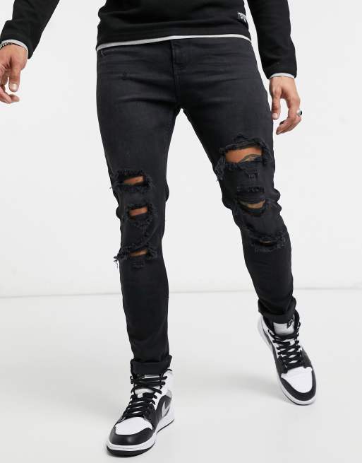 Bershka super skinny fit jeans in black with rips