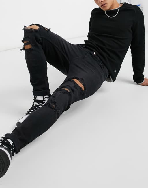 Bershka super skinny fit jeans in black with rips