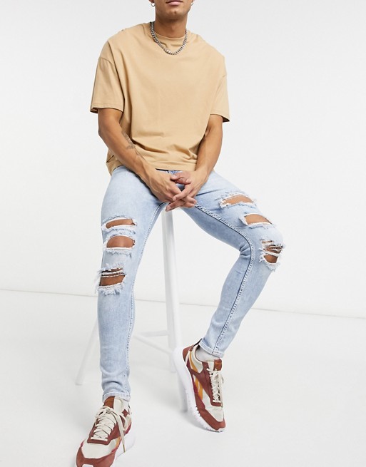 Bershka super skinny fit jeans in blue with rips