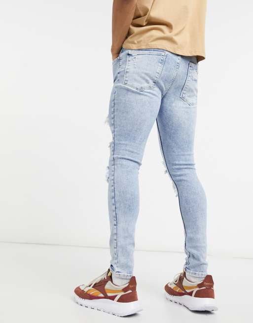 Bershka super skinny fit blue with rips | ASOS