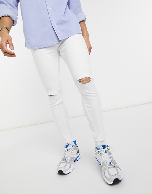 Bershka super skinny fit jeans with rips in white