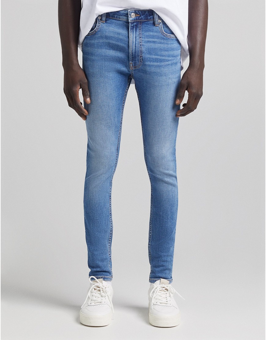 Bershka super skinny jeans in mid blue-Blues