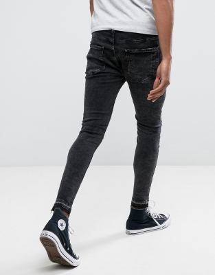 black ripped super skinny jeans