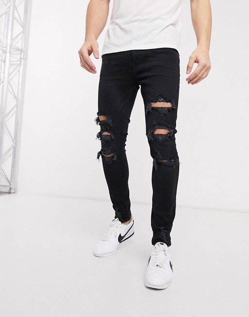 Bershka super skinny jeans with rips in black