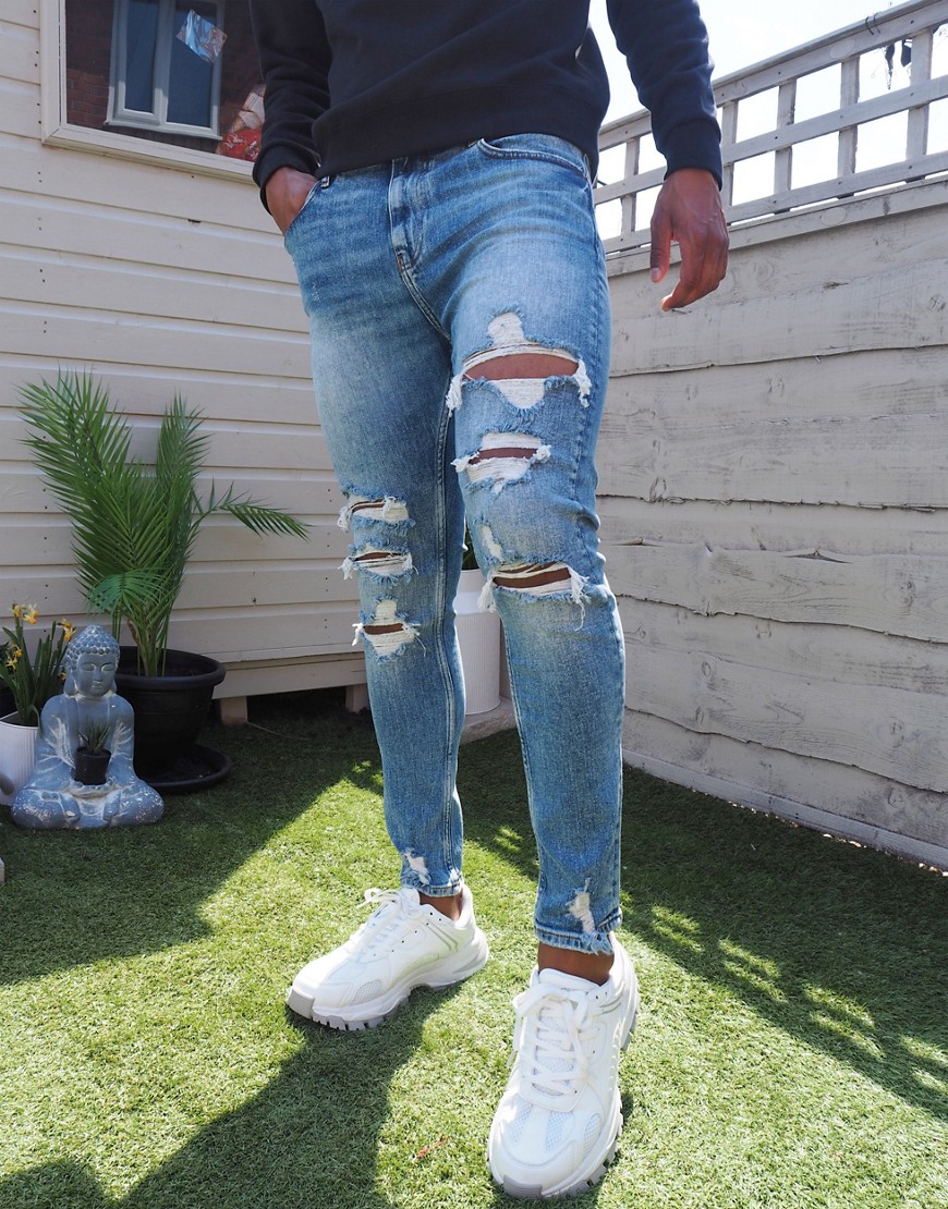 Bershka super skinny jeans with rips in blue-Blues