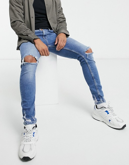 Bershka super skinny jeans with rips in light blue