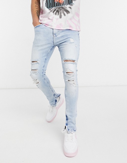 Bershka super skinny jeans with rips in light blue