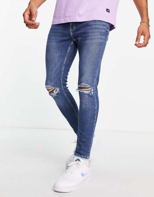 Bershka super skinny jeans with rips in mid blue