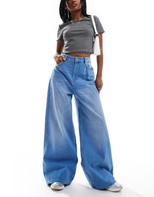 super wide leg jeans in washed light blue