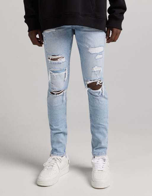 Bershka - Superskinny jeans met scheuren in blauw