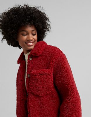 Manteaux et vestes Bershka - Surchemise en imitation peau de mouton à poche - Rouge