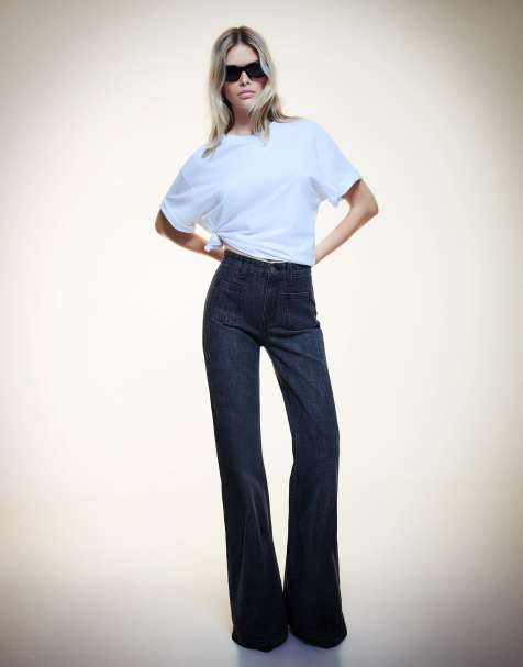 Bershka – Svarta, utsvängda jeans i comfort-modell med fickor - view 1