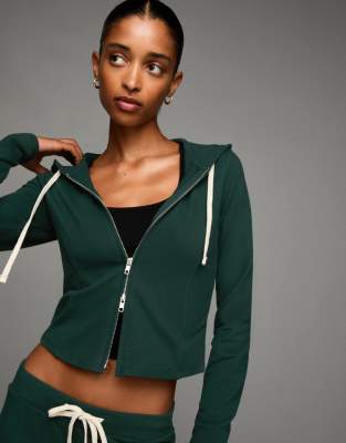 Bershka - Sweat à capuche zippé - Vert
