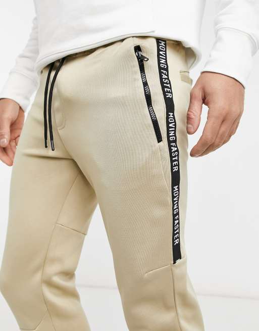 Bershka sweatpants with taping in beige scuba | ASOS