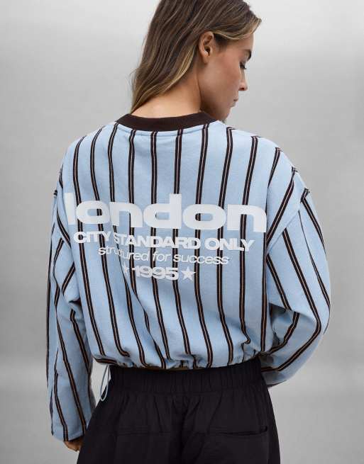 Bershka sweatshirt med V-hals og print i lyseblå, 3 af 5