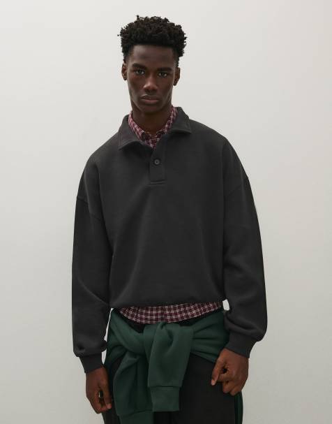 Bershka Sweatshirt mit Knopfleiste und Polokragen in Schwarz - view 1