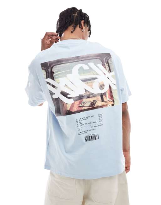 Bershka - T-shirt avec imprimé fenêtre au dos - Bleu clair