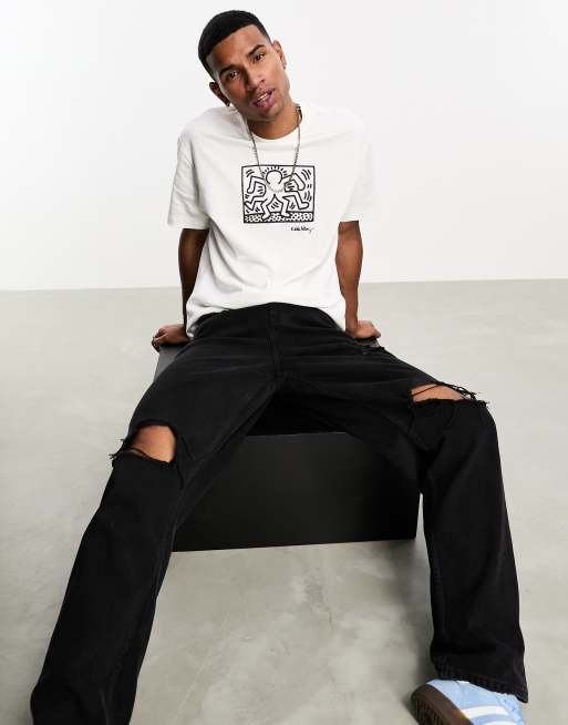 Bershka - T-shirt met Keith Haring-print in wit