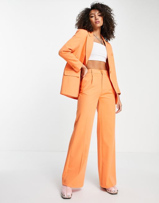 The Frolic flared tailored pants in orange satin - part of a set