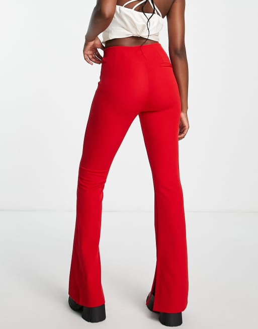 Bershka tailored split hem pants in red ASOS