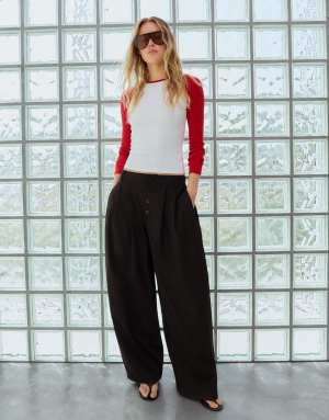 Bershka Tall balloon fit pleated button trousers in black