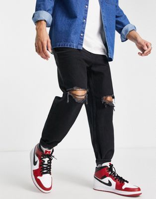 Bershka tapered jeans with rips in black