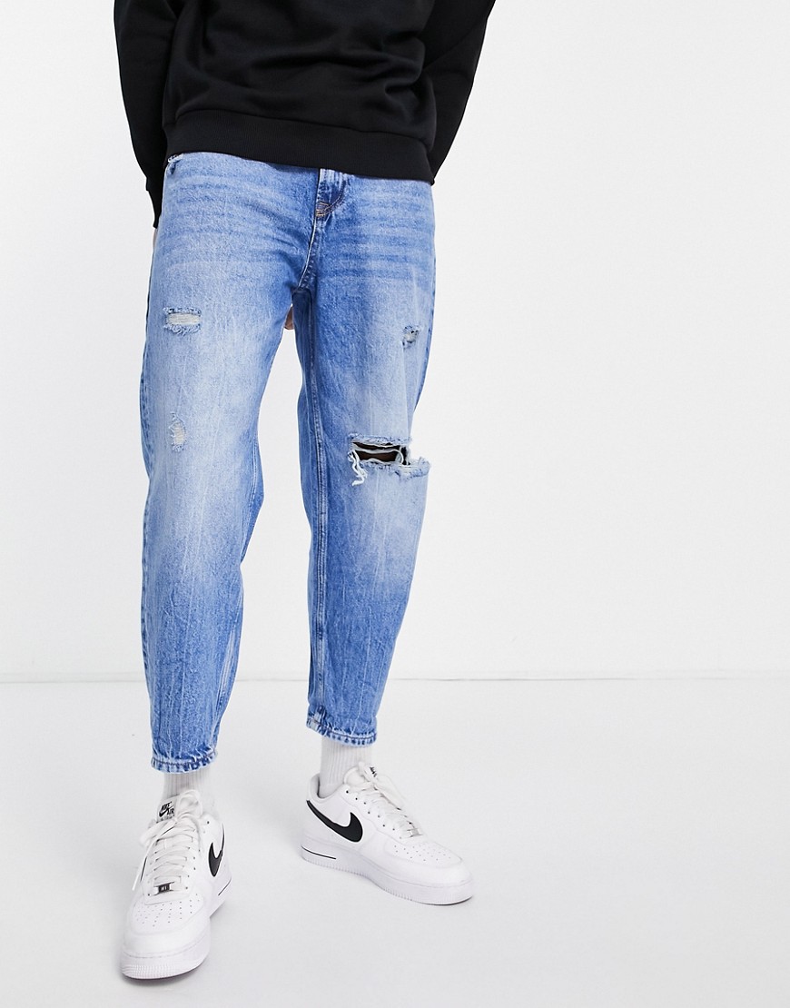Bershka tapered jeans with rips in mid blue-Blues