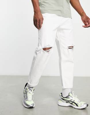 Bershka tapered jeans with rips in white-Blue