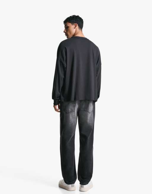 Bershka Tapered loose fit jeans in black ASOS